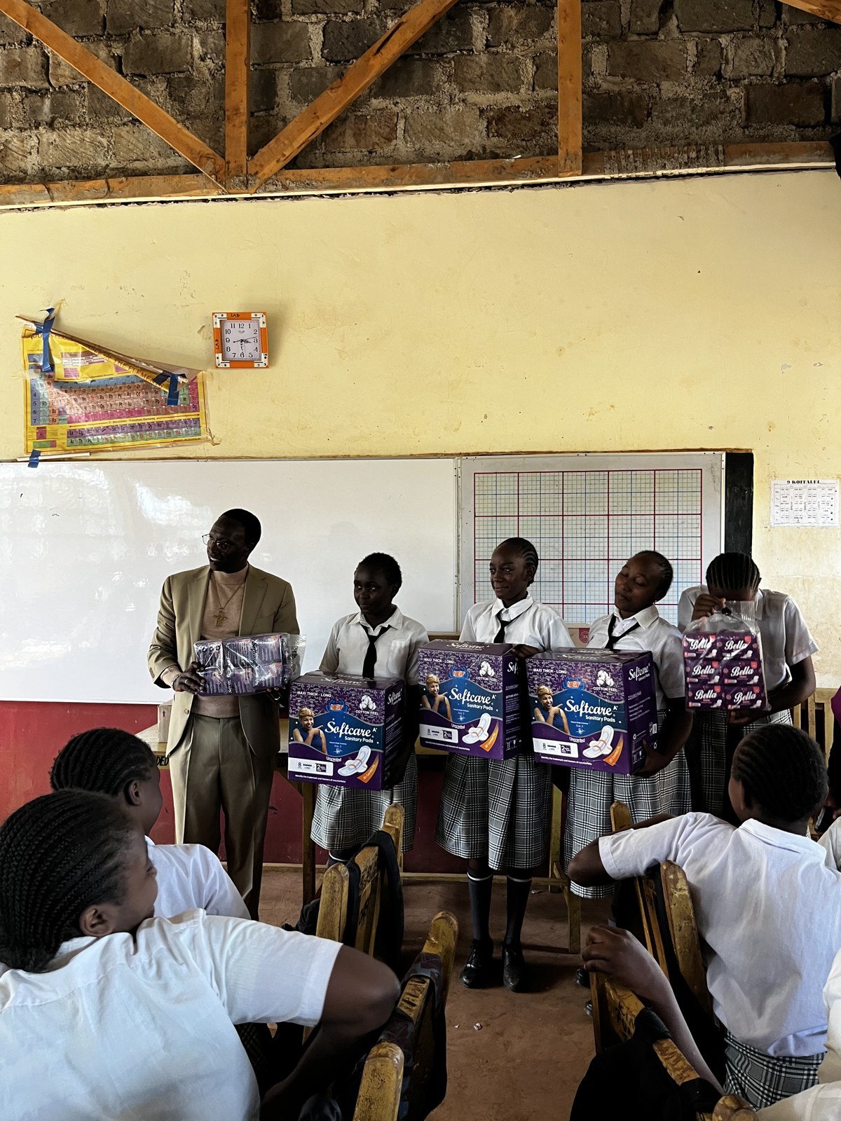 Boxes of sanitary pads at a school outreach presentation